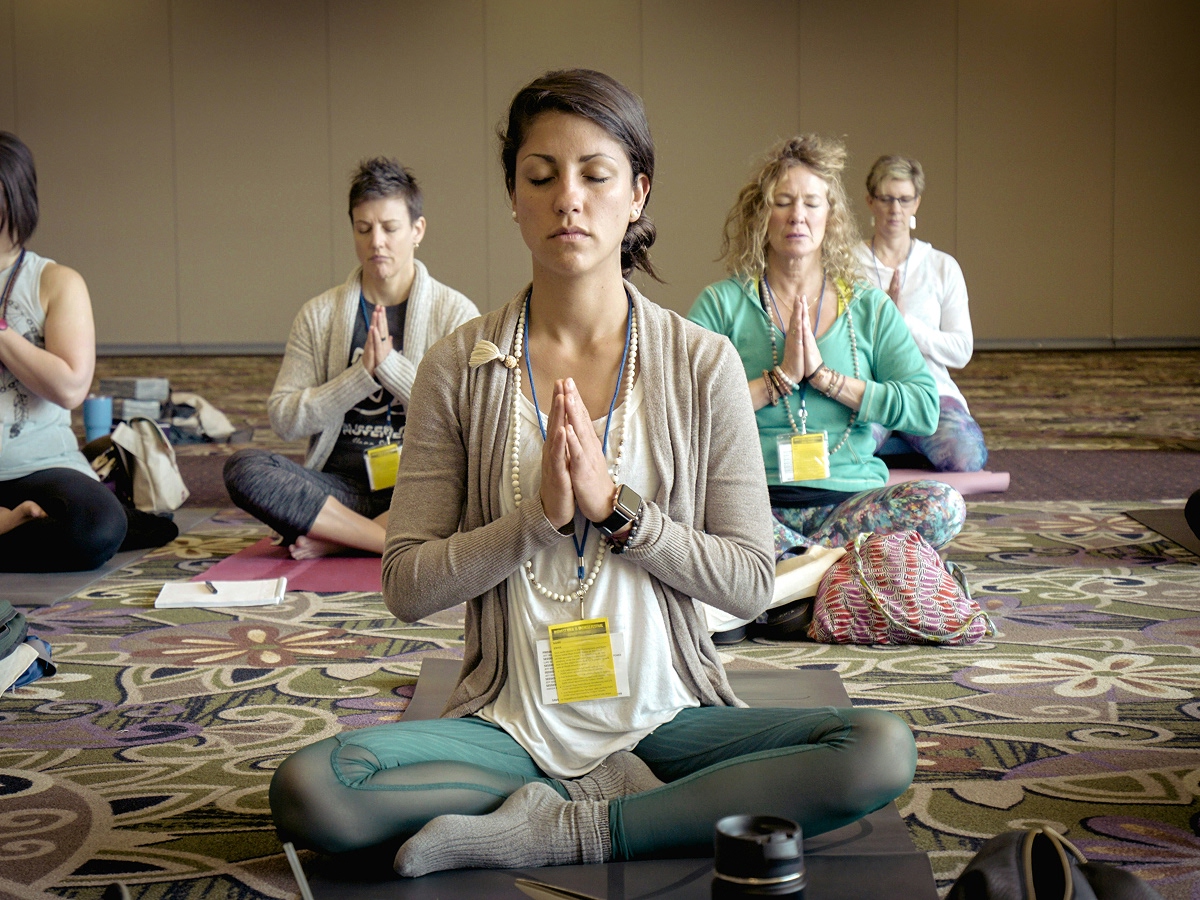 Group of people doing yoga photo